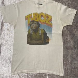 Fashion Nova shirt in color white, blue, yellow and green in size small.